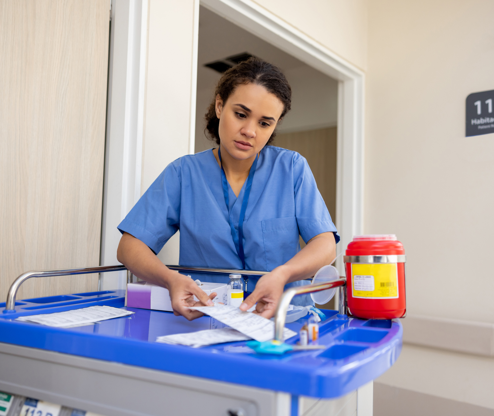 Healthcare professional arranging treatment materials