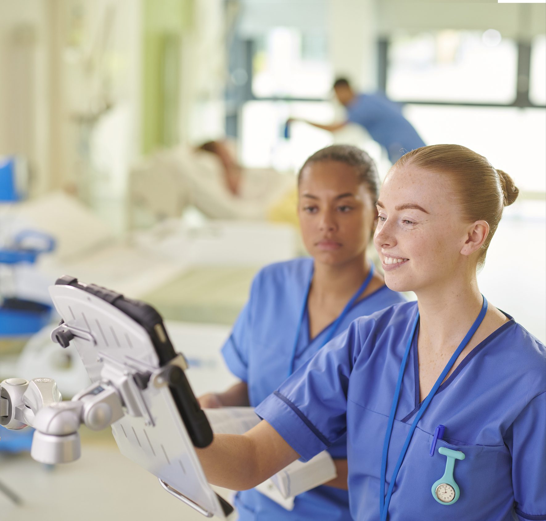 Medical staff examining patient data
